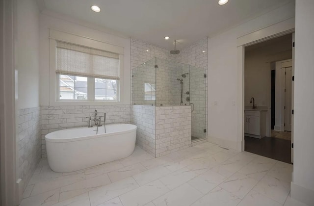 1019 Glasgow Dr, Murfreesboro, TN 37130 - full bath featuring a freestanding tub, vanity, a stall shower, recessed lighting, and marble finish floor