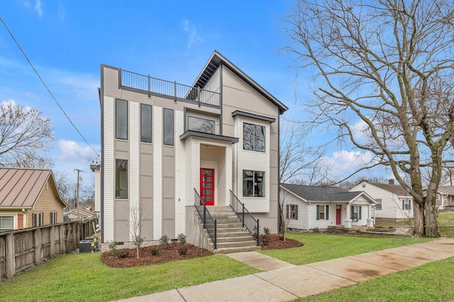 3904 Nevada Ave, Nashville, TN 37209 - view of front facade with central AC unit, crawl space, fence, and a front lawn