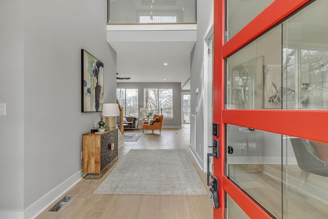 3904 Nevada Ave, Nashville, TN 37209 - foyer with a high ceiling, wood finished floors, baseboards, and recessed lighting