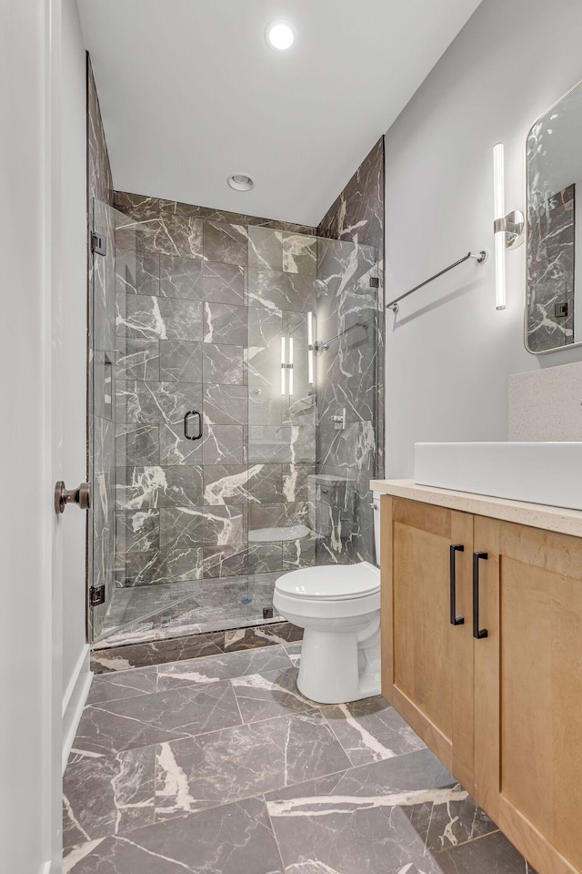 3904 Nevada Ave, Nashville, TN 37209 - full bath with vanity, recessed lighting, toilet, marble finish floor, and a marble finish shower