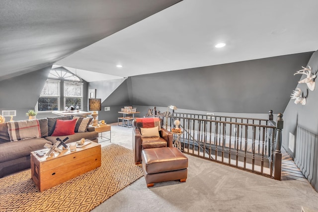interior space featuring vaulted ceiling, carpet, and recessed lighting