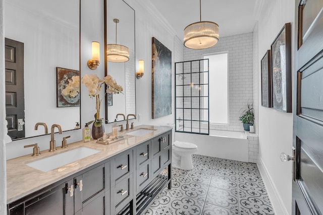 full bath with double vanity, tile patterned floors, toilet, and a sink