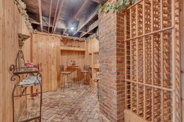 234 Myles Manor Ct, Franklin, TN 37064 - wine area featuring brick floor and wooden walls