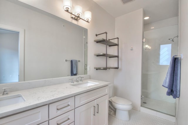 full bath featuring toilet, a stall shower, tile patterned floors, and double vanity