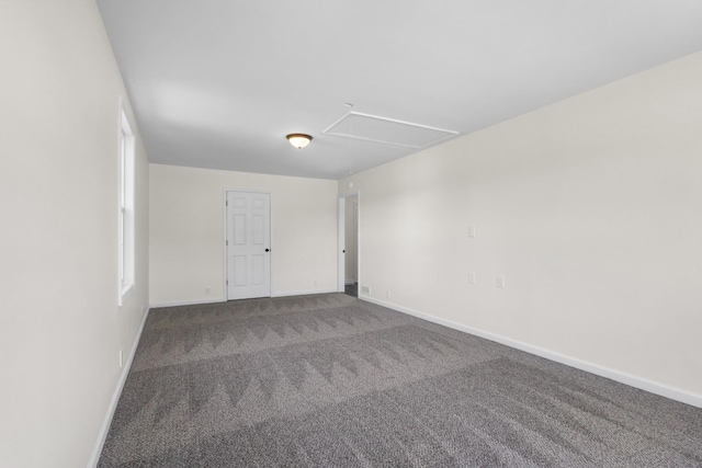 438 Pacific Ave, Oak Grove, KY 42262 - carpeted spare room featuring baseboards and attic access