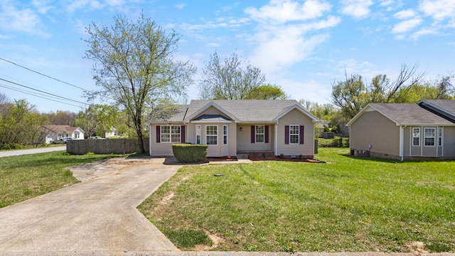 438 Pacific Ave, Oak Grove, KY 42262 - view of front of home featuring central air condition unit, driveway, fence, and a front lawn