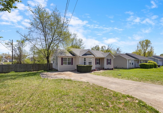 438 Pacific Ave, Oak Grove, KY 42262 - ranch-style home with driveway, fence, and a front lawn