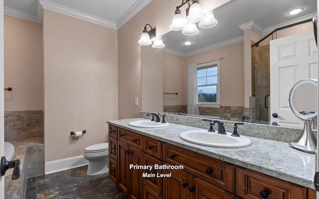 full bathroom featuring a sink, ornamental molding, and toilet