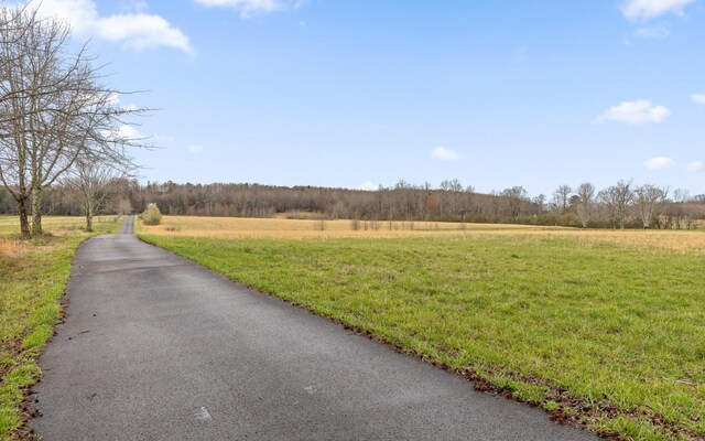 view of street featuring a rural view