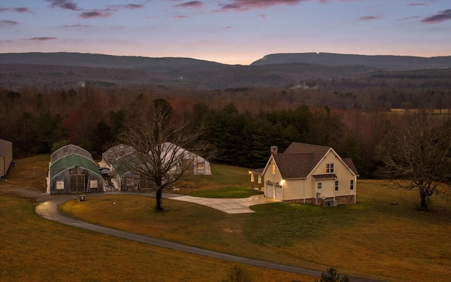 view of mountain feature featuring a wooded view