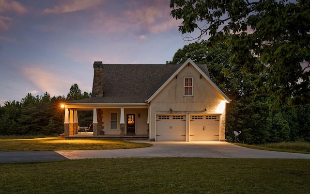 10600 Skyridge Trl, Soddy Daisy, TN 37379 - view of front of house featuring a chimney, covered porch, concrete driveway, a yard, and roof with shingles