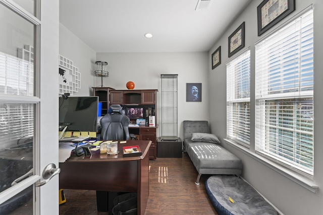 office space with dark wood-type flooring, recessed lighting, and visible vents