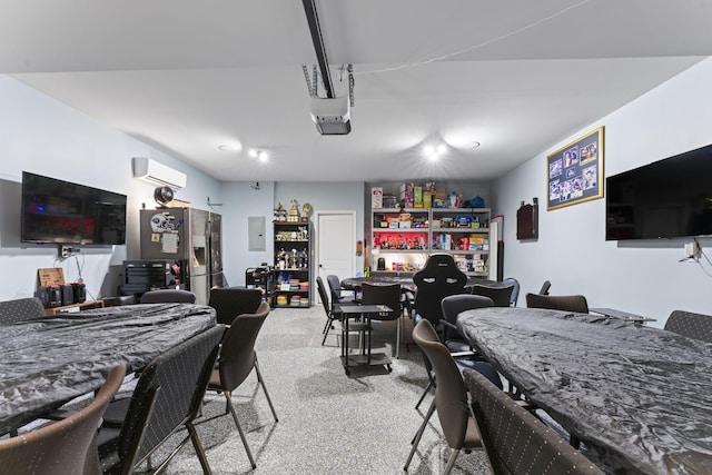 carpeted dining area with a wall mounted air conditioner and electric panel