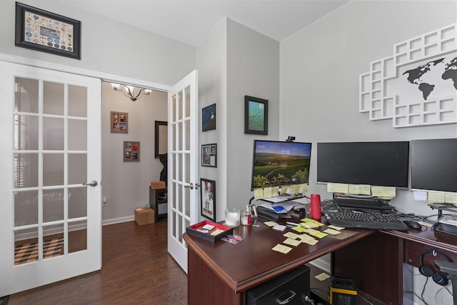 office area with baseboards, french doors, wood finished floors, and a notable chandelier