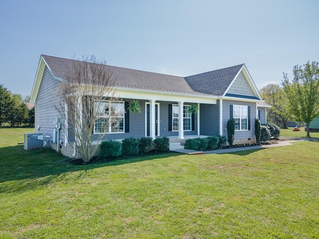 ranch-style house featuring roof with shingles, crawl space, a front lawn, and covered porch