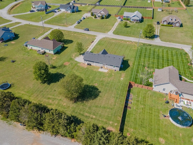 birds eye view of property with a rural view