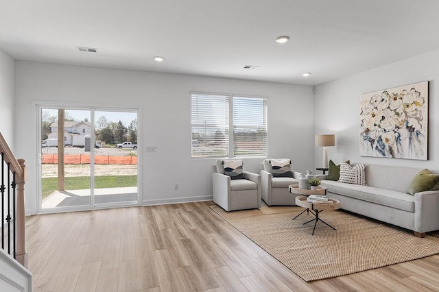 8524 Turnbull Dr, Pleasant View, TN 37146 - living room with healthy amount of natural light, light wood-style flooring, recessed lighting, and baseboards