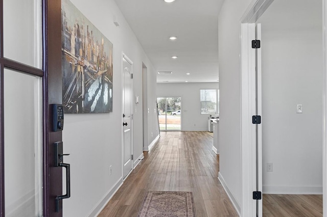 8524 Turnbull Dr, Pleasant View, TN 37146 - hallway featuring wood finished floors, recessed lighting, and baseboards