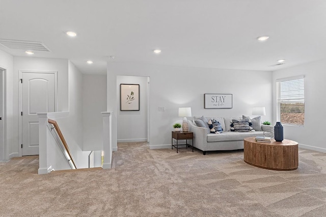 8524 Turnbull Dr, Pleasant View, TN 37146 - living area featuring light carpet, baseboards, and recessed lighting