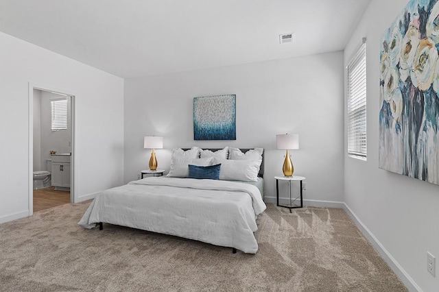 8524 Turnbull Dr, Pleasant View, TN 37146 - bedroom featuring carpet flooring, baseboards, and ensuite bath