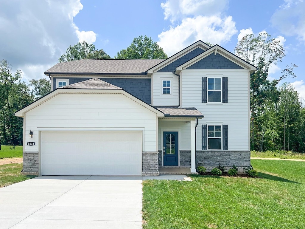 8531 Turnbull Dr, Pleasant View, TN 37146 - craftsman inspired home featuring a garage, concrete driveway, a front lawn, and stone siding