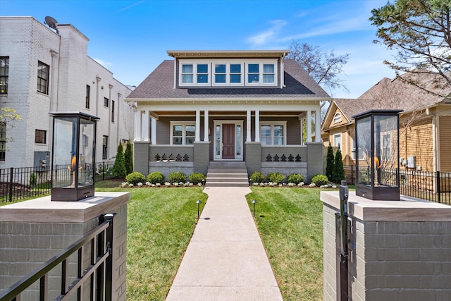 2109 10th Ave S, Nashville, TN 37204 - bungalow-style home featuring a front yard, fence, and covered porch