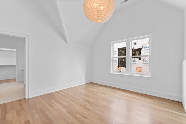 2109 10th Ave S, Nashville, TN 37204 - additional living space featuring light wood-style flooring, visible vents, baseboards, and vaulted ceiling