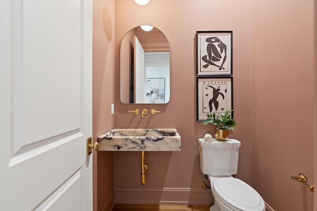 2109 10th Ave S, Nashville, TN 37204 - bathroom featuring toilet and baseboards