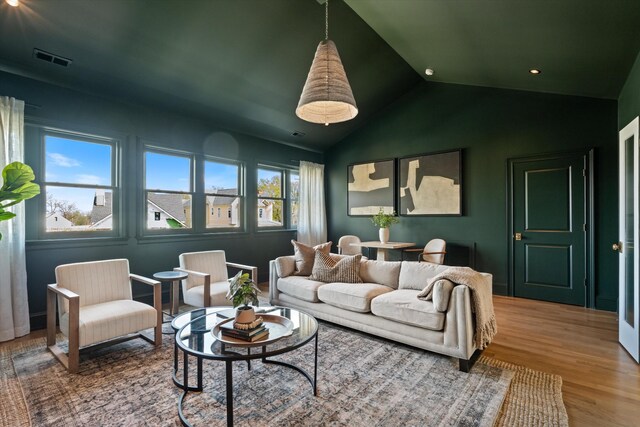 2109 10th Ave S, Nashville, TN 37204 - living room featuring visible vents, wood finished floors, and lofted ceiling