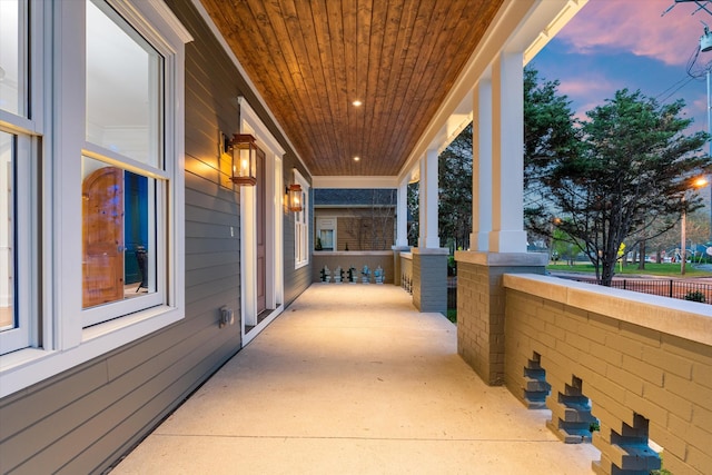 2109 10th Ave S, Nashville, TN 37204 - patio terrace at dusk featuring covered porch