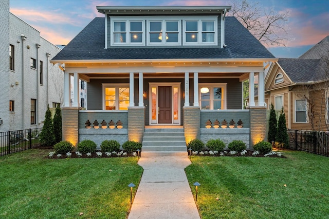 2109 10th Ave S, Nashville, TN 37204 - view of front of house with a porch, a shingled roof, and fence