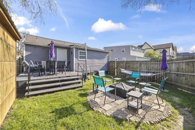 1204A Keller Ave, Nashville, TN 37216 - view of yard with a residential view, outdoor dining space, a fenced backyard, and a deck