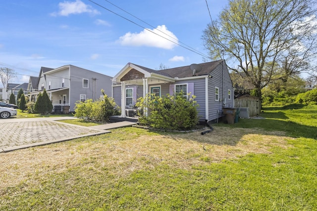1204A Keller Ave, Nashville, TN 37216 - view of front of house with an outbuilding, a storage shed, and a front lawn