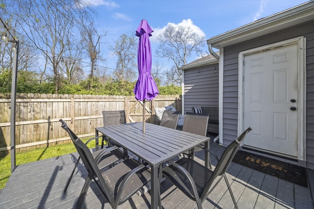 1204A Keller Ave, Nashville, TN 37216 - wooden terrace with outdoor dining space and fence