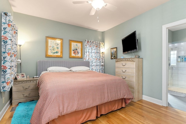 134 Joe Blanton Rd, Woodbury, TN 37190 - bedroom featuring light wood-style floors, baseboards, and connected bathroom