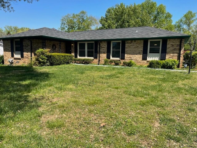 2159 Michael Dr, Clarksville, TN 37043 - single story home featuring a front lawn and brick siding