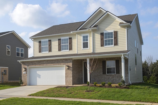 craftsman-style house featuring a front lawn, driveway, an attached garage, and brick siding