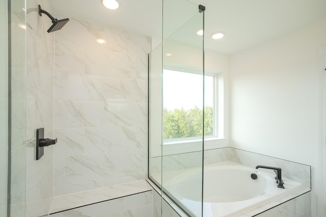 full bath with recessed lighting, tiled shower, and a garden tub