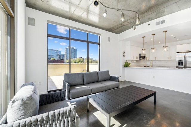 1510 Demonbreun St Unit 511, Nashville, TN 37203 - living room with concrete flooring and a view of city