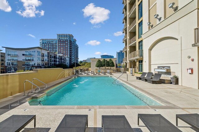 1510 Demonbreun St Unit 511, Nashville, TN 37203 - community pool featuring a patio