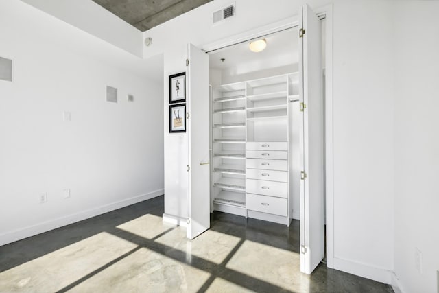 1510 Demonbreun St Unit 511, Nashville, TN 37203 - unfurnished bedroom featuring finished concrete flooring