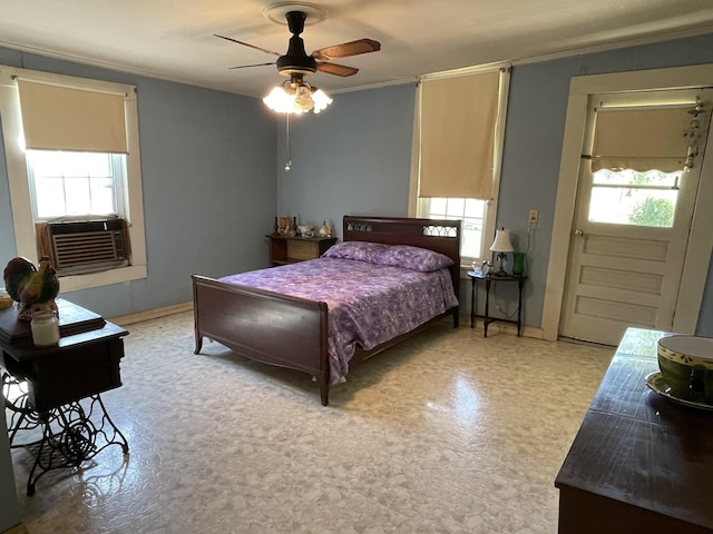 312 Neal St, Huntland, TN 37345 - bedroom with cooling unit, crown molding, multiple windows, and light floors