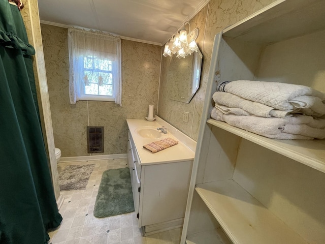 312 Neal St, Huntland, TN 37345 - full bath with vanity, visible vents, crown molding, and toilet
