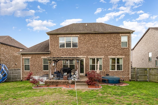 5344 Highland Place Way, Hermitage, TN 37076 - rear view of property featuring a hot tub, a pergola, a patio area, brick siding, and roof with shingles