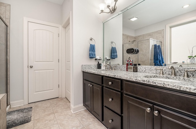 5344 Highland Place Way, Hermitage, TN 37076 - full bath with a stall shower, baseboards, double vanity, and tile patterned floors