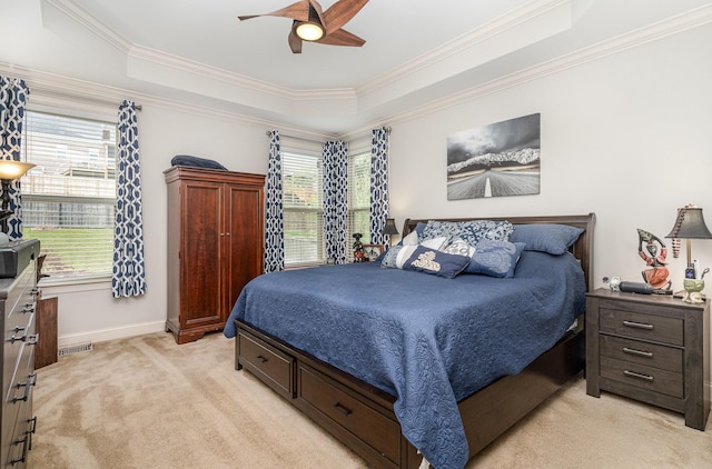 5344 Highland Place Way, Hermitage, TN 37076 - bedroom featuring light colored carpet, a raised ceiling, multiple windows, and ornamental molding