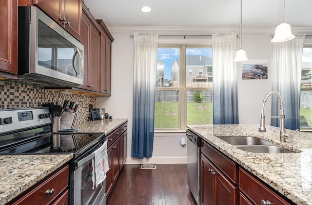 5344 Highland Place Way, Hermitage, TN 37076 - kitchen with stainless steel appliances, a sink, baseboards, dark wood-style flooring, and ornamental molding