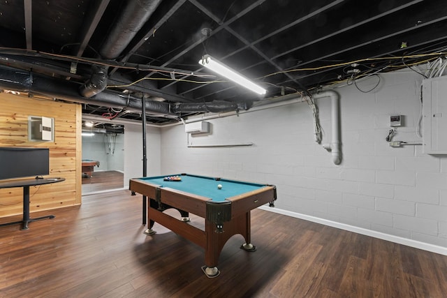 game room featuring billiards, concrete block wall, electric panel, and dark wood finished floors