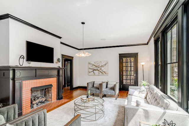 931 Caldwell Ln, Nashville, TN 37204 - living area featuring crown molding, wood finished floors, and a wealth of natural light
