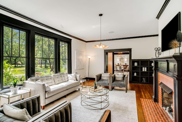 931 Caldwell Ln, Nashville, TN 37204 - living room with plenty of natural light, a brick fireplace, crown molding, and wood finished floors